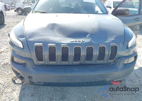 2015 Jeep Cherokee Trailhawk from USA, damaged, VIN 1C4PJMBS3FW693461